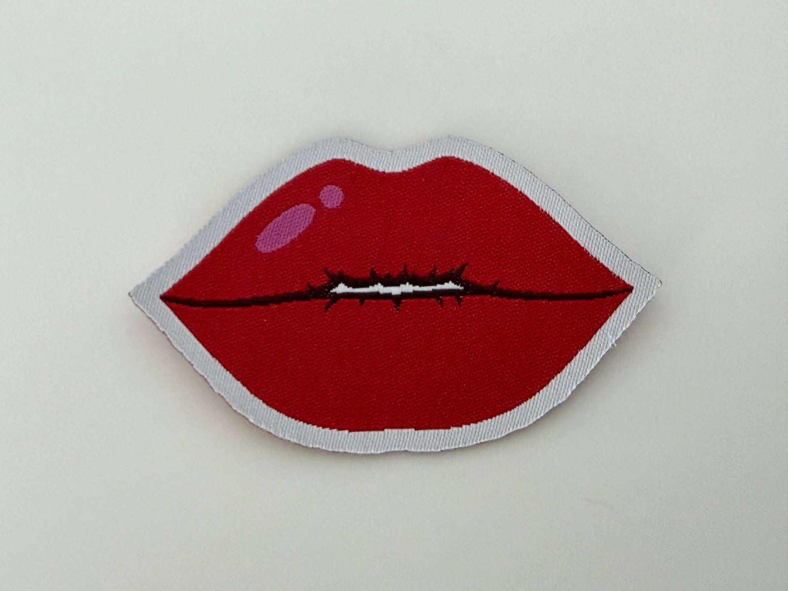 Produzione di patch HD personalizzate in tessuto Jacquard per Brescia